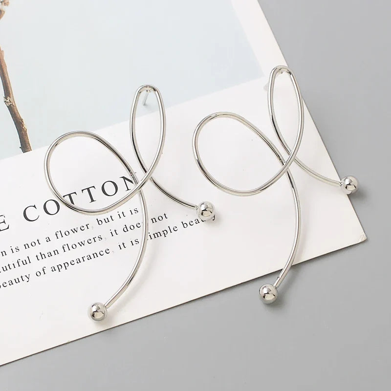 עגילי טוויסט